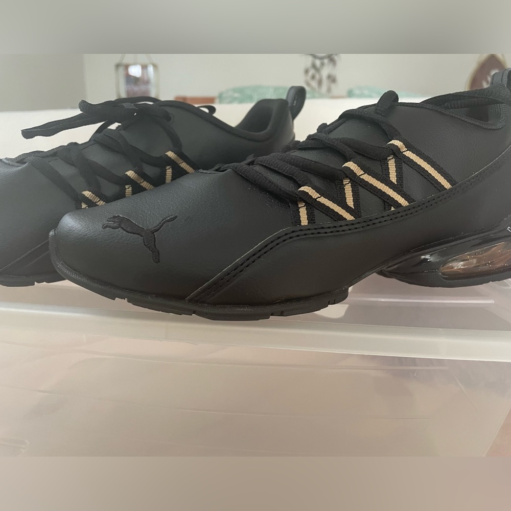 Puma Black and gold soft foam